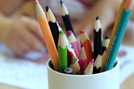 assorted-color color pencil lot in white dispenser thumbnail