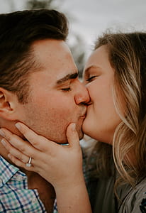 man and woman kissing each other thumbnail