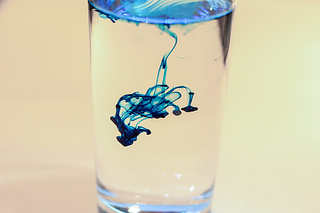 blue ink drop in water in glass thumbnail