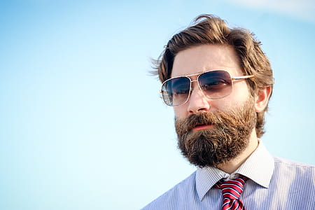 man in white collared shirt with red necktie thumbnail