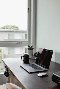 turn off laptop and black mug on desk thumbnail