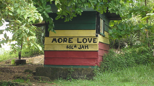 green, red, and yellow wooden shed during daytime thumbnail