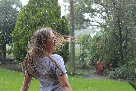 woman dancing on rain thumbnail
