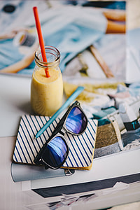 Healthy shake in a small bottle with a straw and sunglasses thumbnail