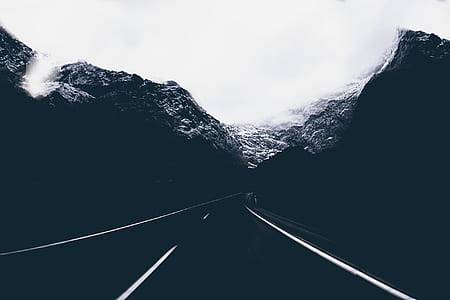 Landscape Photo of Road in the Middle of Mountains thumbnail