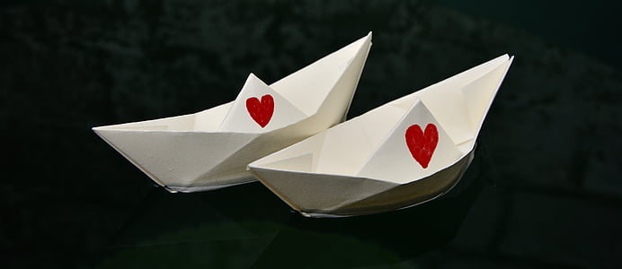 two white paper boats thumbnail