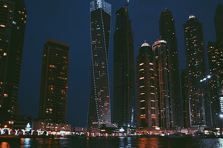 high-rise buildings near body of water thumbnail