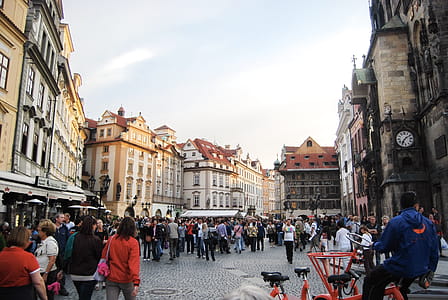 Group of People in Front of Building Structures thumbnail