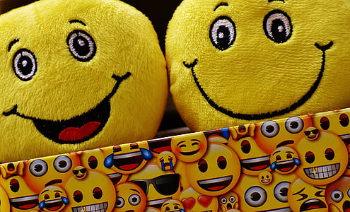 two yellow emoji pillows thumbnail