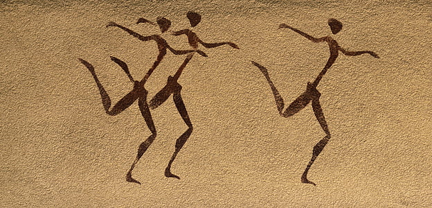 pyrography of three dancing humans thumbnail