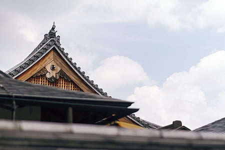close up photo of brown and black wooden roof thumbnail