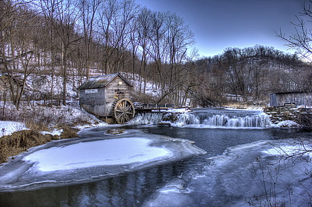 watermill beside lake and forest thumbnail