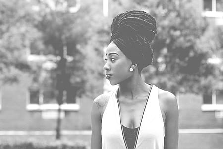 woman wearing white sleeveless top grayscale photo thumbnail