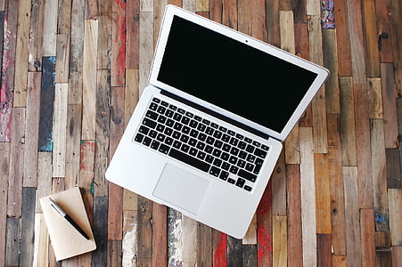 MacBook AIr near black and gray twist pen thumbnail