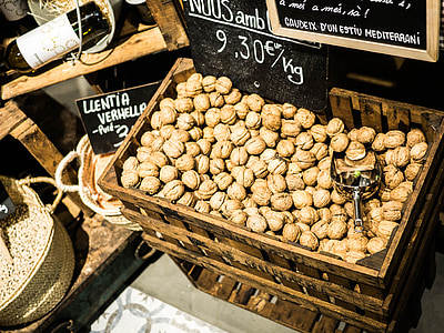 brown nuts in brown wooden crate thumbnail