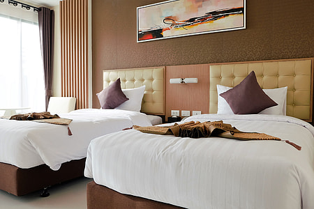 brown and beige wooden bed frame thumbnail