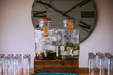 two glass dispensers on table thumbnail