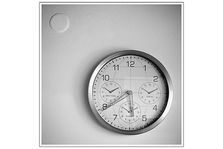 round grey metal chronograph wall clock displaying 5:39 thumbnail