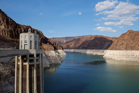 concrete building beside body of water thumbnail