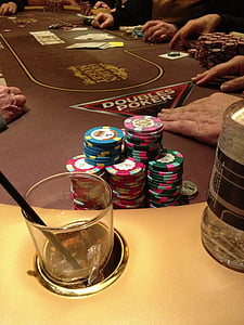 poker chips on table thumbnail