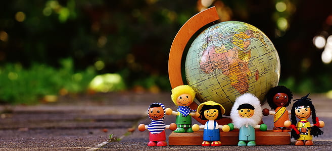 LEGO minifig beside world globe thumbnail