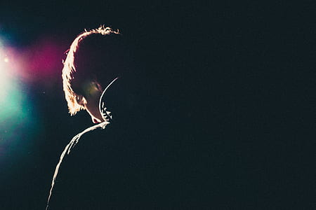 man standing against the light thumbnail