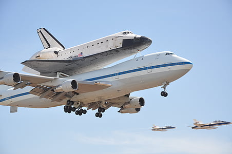 two white airliners thumbnail