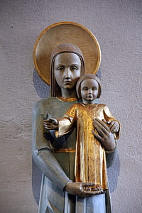 religious statue beside wall thumbnail