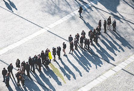 aerial photography of group of people standing on ground thumbnail
