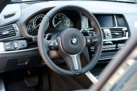 black BMW steering wheel thumbnail