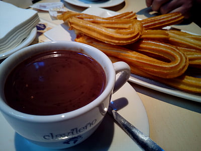 toasted bread beside teacup with chocolate thumbnail
