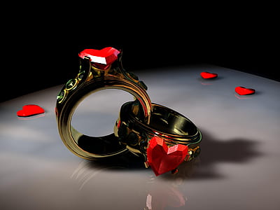 close-up photo of gold-colored couple rings thumbnail