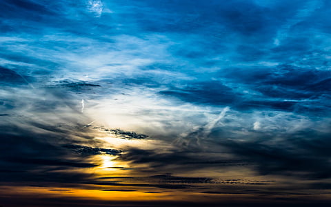 photo of ocean under nimbus clouds thumbnail