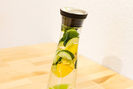 glass bottle with water and slice of fruit thumbnail