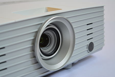 gray projector on white surface thumbnail