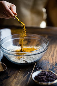 person holding teaspoon thumbnail