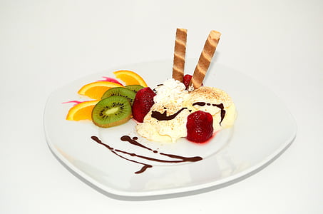 white ceramic plate with white icing cake thumbnail