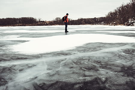 man standing on ice field thumbnail