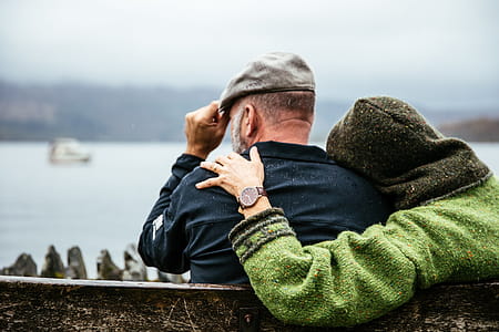 Couple Sits In British Rain Photo thumbnail