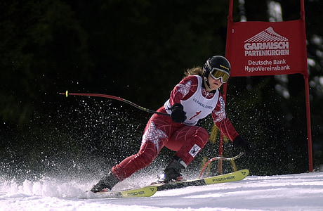woman wearing snow goggles and red jumpsuit thumbnail