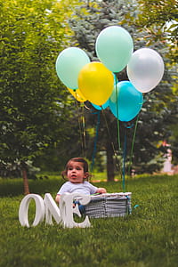 Girl and Assorted Color Balloons thumbnail