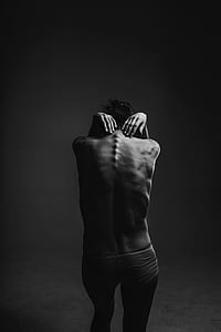 grayscale photo of topless person thumbnail