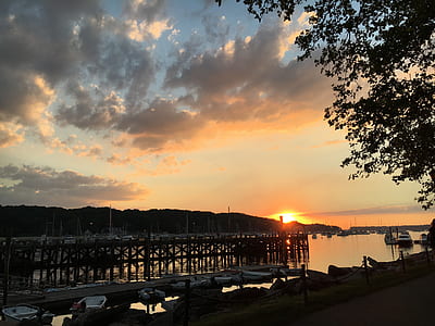 Brown Wooden Dock on Body of Water during Sunset thumbnail