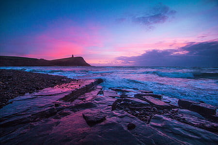 seashore under red cloudy skyt thumbnail
