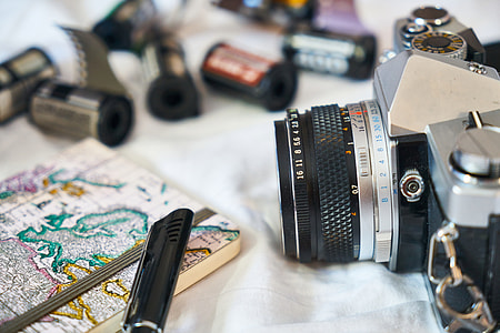 shallow focus photography of black and silver camera thumbnail