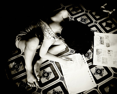 person writing on paper thumbnail