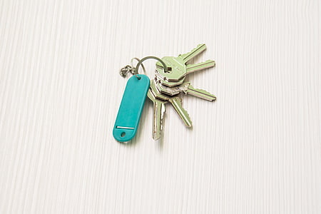 grey keys and green plastic tag thumbnail
