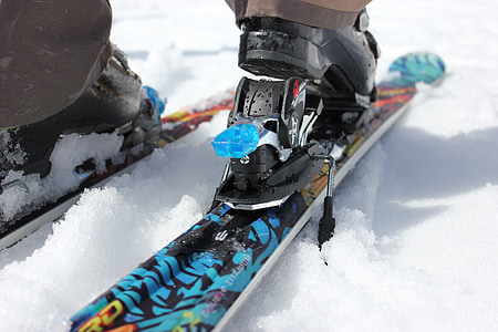 person wearing snow skis with bindings thumbnail