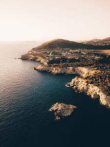 aerial photography of island during daytime thumbnail