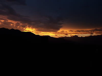 landscape photography of mountain range during golden hour thumbnail